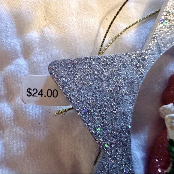 A Glittering Silver Star Christmas Ornament with a jolly Santa holding a Tree - Picture 4 of 6